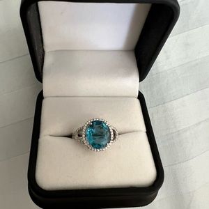 an Aqua Marine stone with sterling silver ring